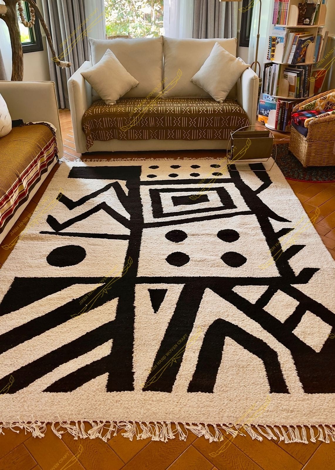 Handwoven JHWC rug displayed in a living room