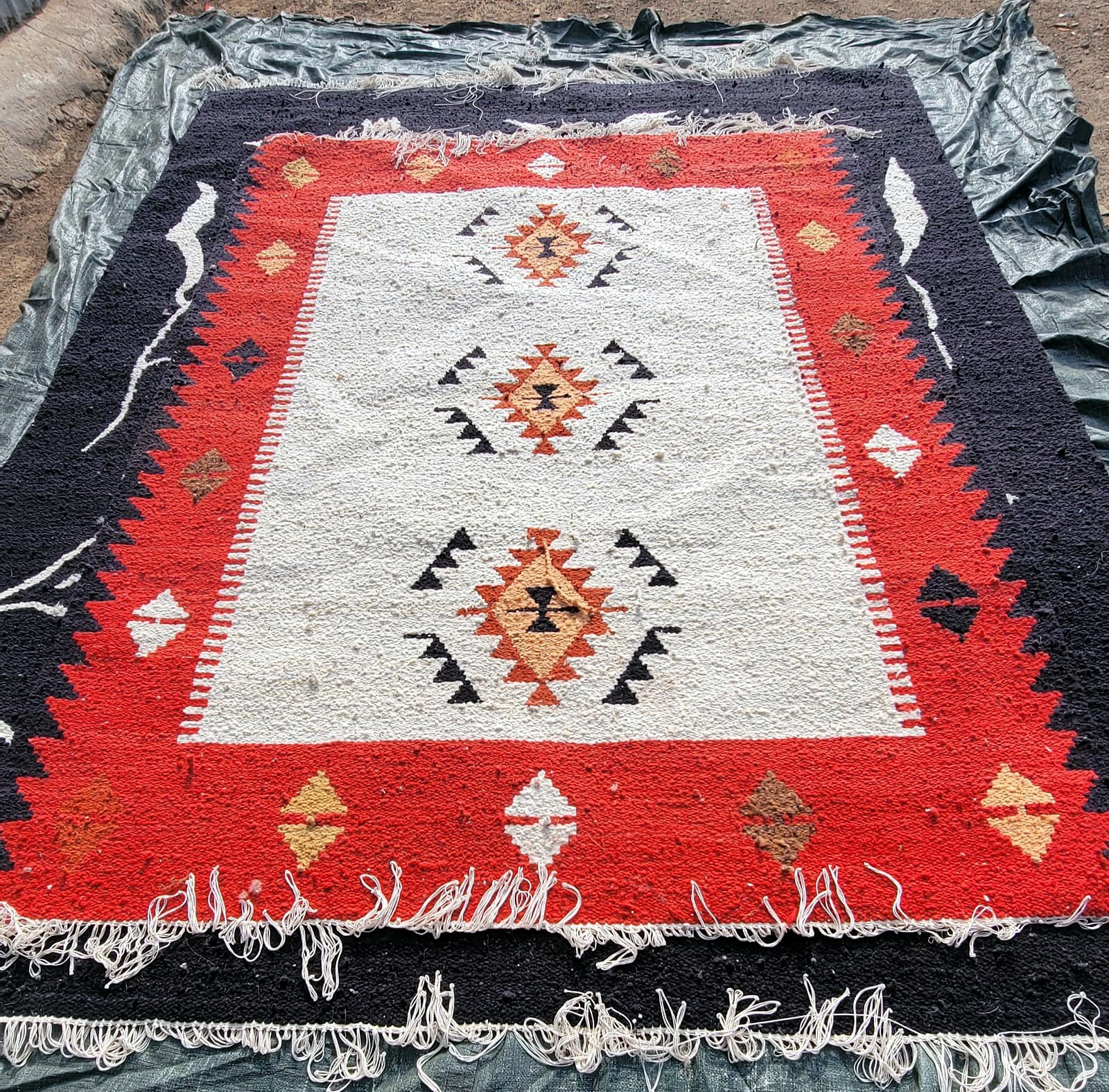 JHWC red geometric handwoven rug